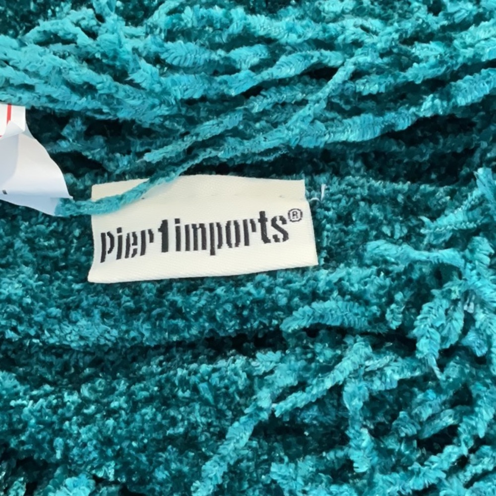 Pier 1 Imports fringed throw.